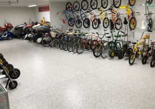 Retail bike shop with epoxy floor coating and showroom layout