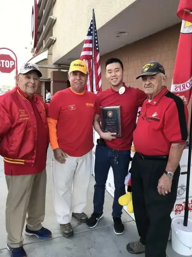 John Mitchell (Director of local Toys for Tots), Ryan Rowe (Mgr of Target Store, Sycamore Square), Bob Martinez (Ass’t Director of Detachment Toys for Tots), and Ramon Arevalo (Detachment 597 member