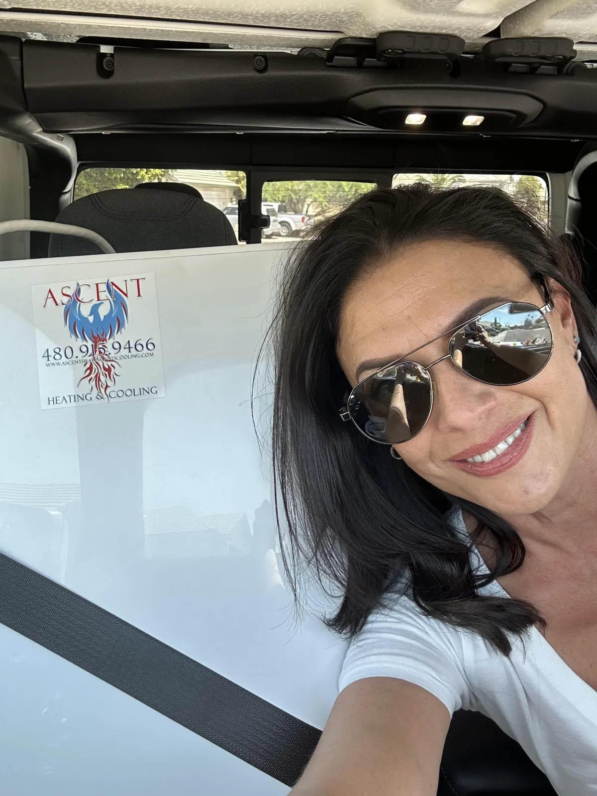 Master HVAC technician Joey Moses performing routine HVAC maintenance at a Paradise Valley residence