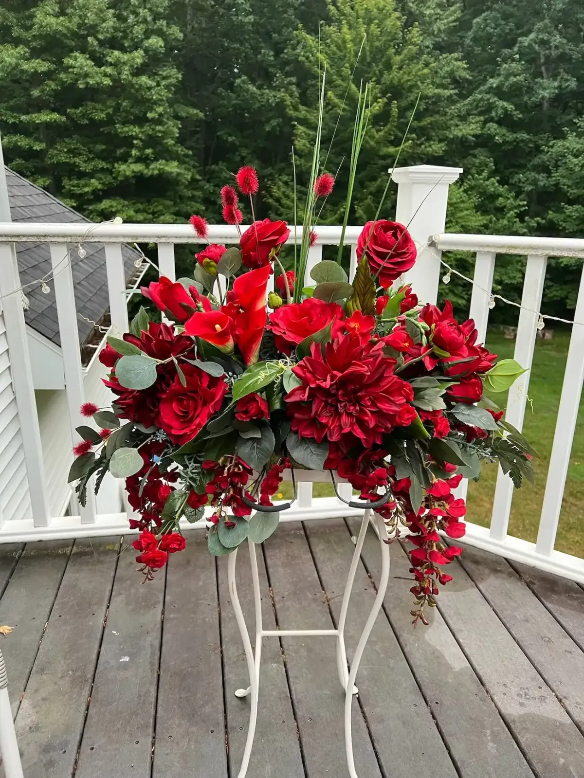 Marblehead MA florist creating luxury corporate event floors  with red roses and dahlia bouquet for local flower delivery