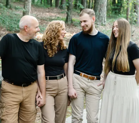 dad talks to his wife and college age son and daughter young adult parenting