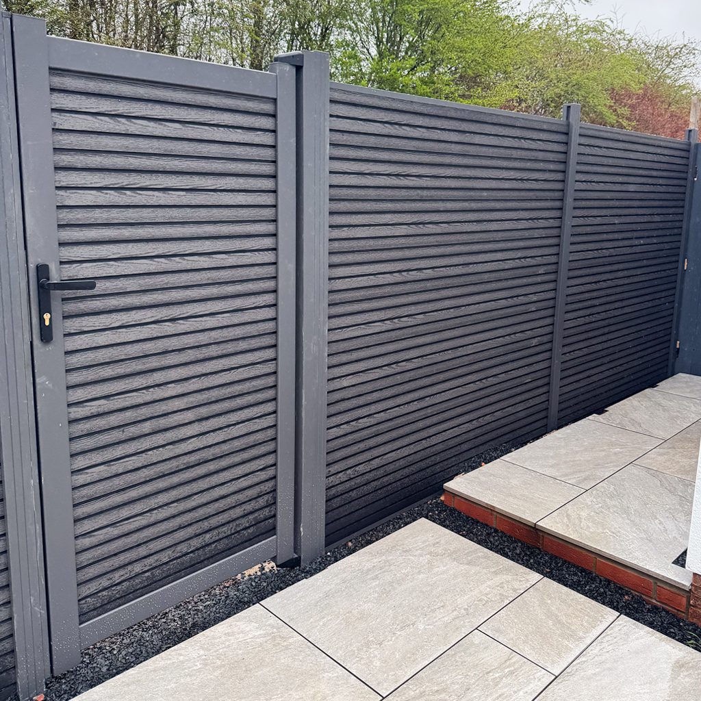 Anthracite Grey composite fencing that we installed with a gate