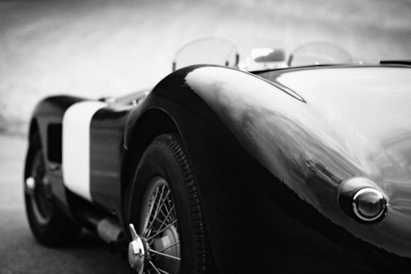 a red truck parked inside of a garage