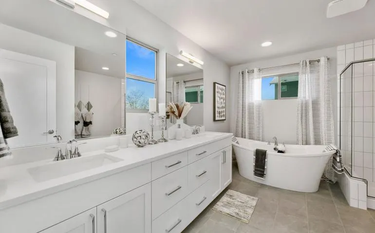 a kitchen with a white door and white cabinets