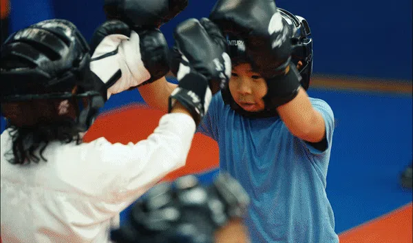 Students working out together in a bright modern gym