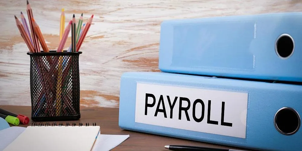 man in white dress shirt sitting beside woman in black long sleeve shirt