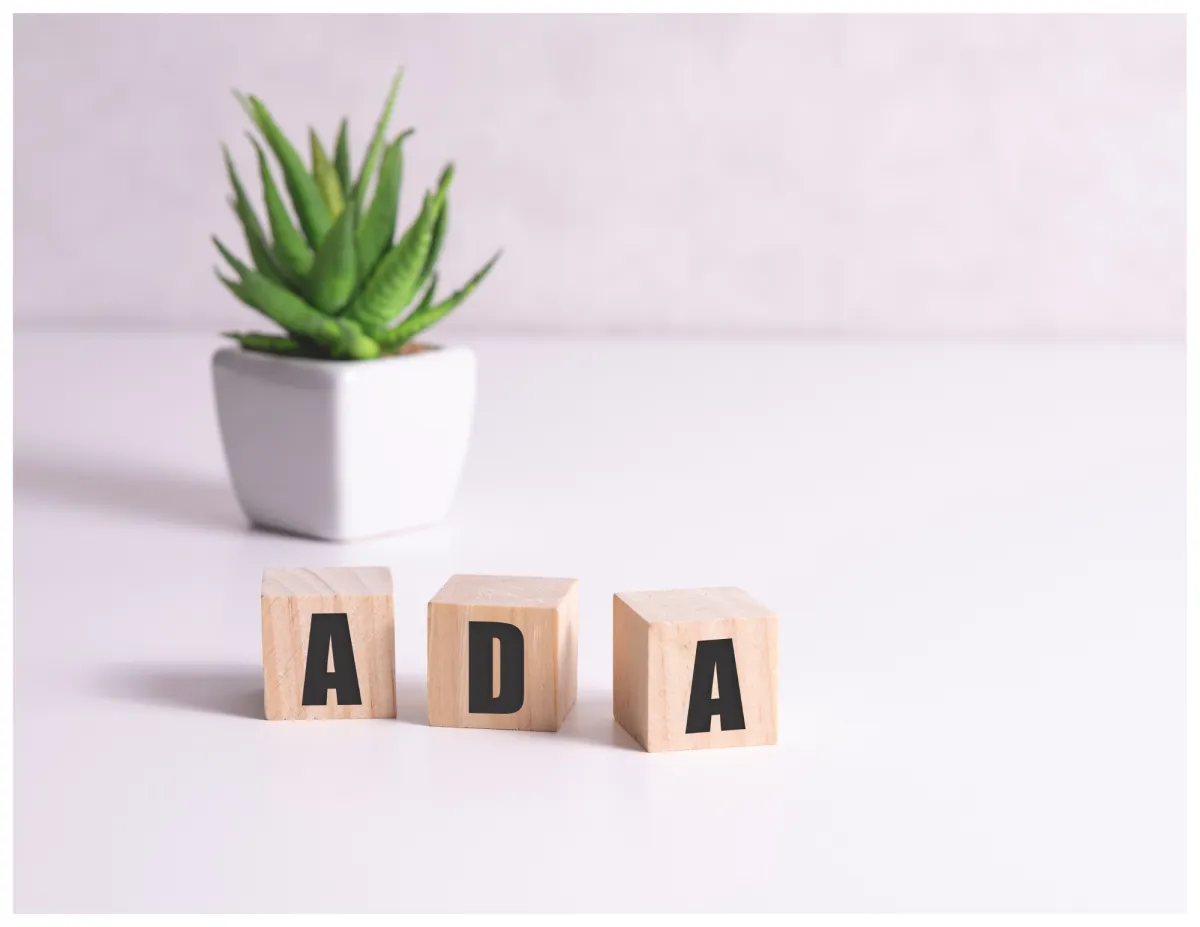 woman placing sticky notes on wall