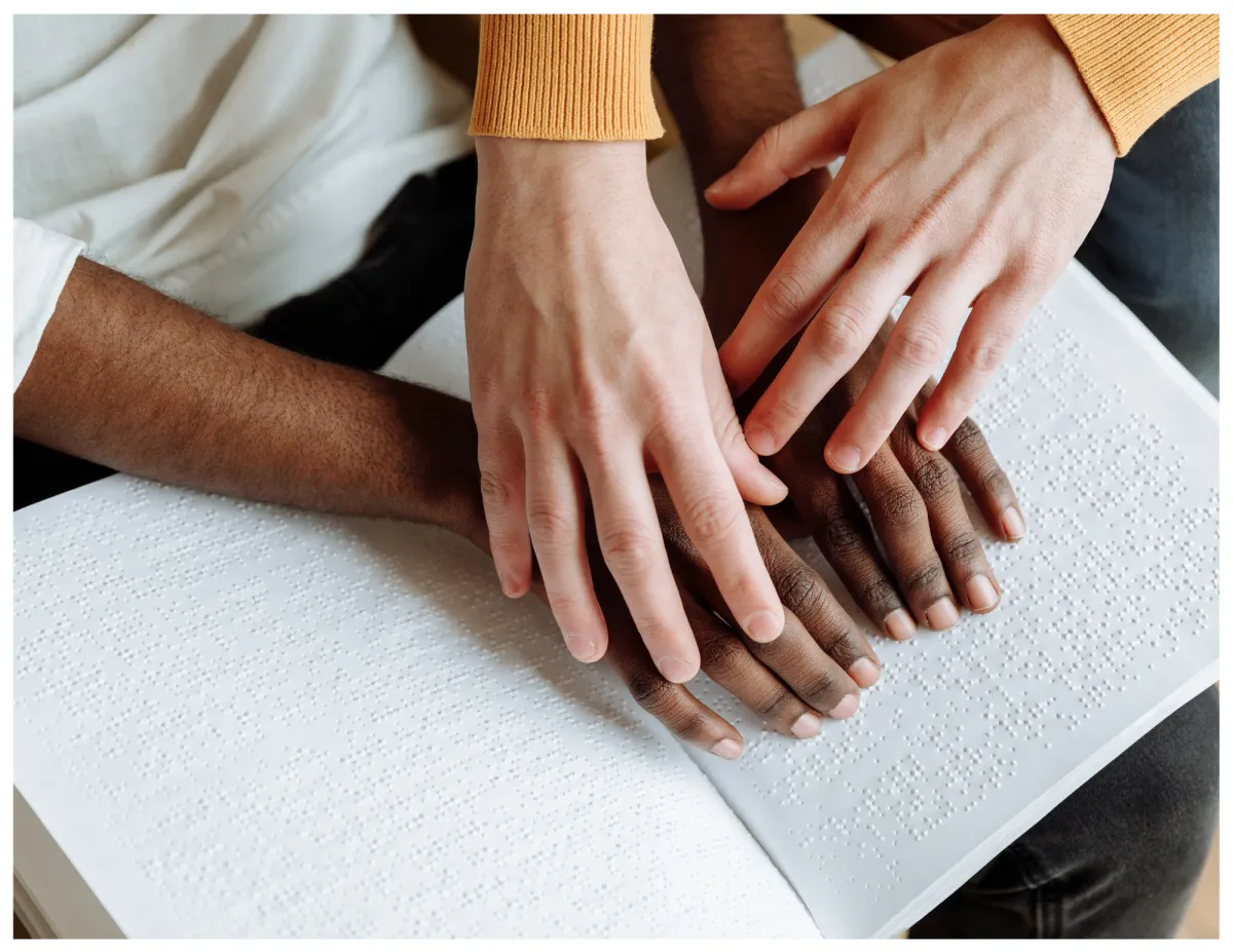 woman placing sticky notes on wall