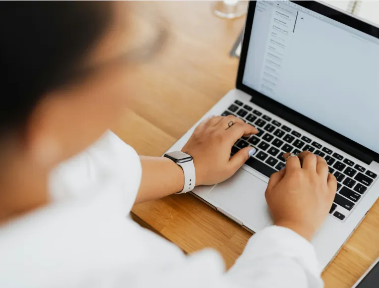 man in white dress shirt sitting beside woman in black long sleeve shirt