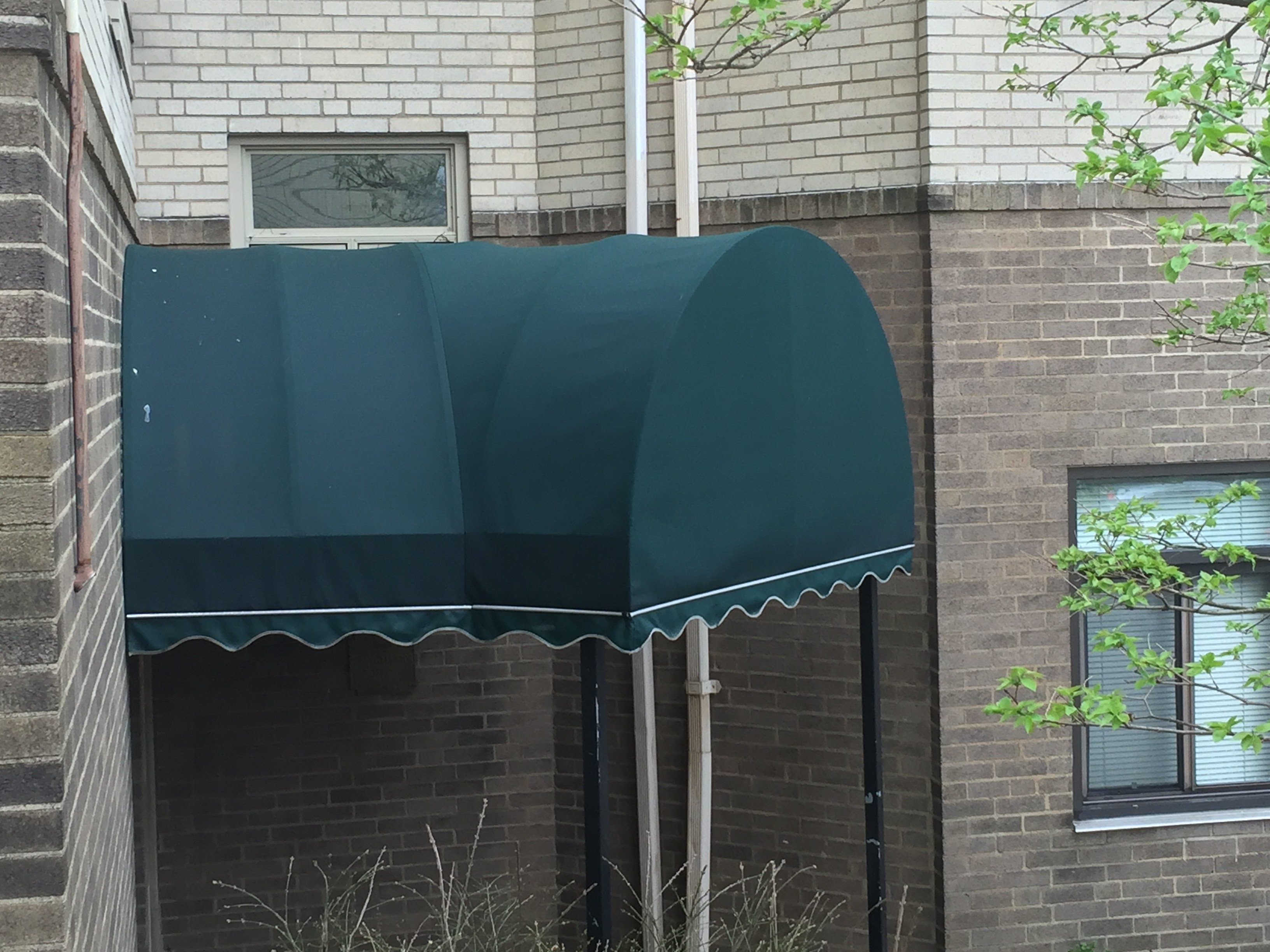 Commercial awning after exterior cleaning – Missions Pressure Washing service example