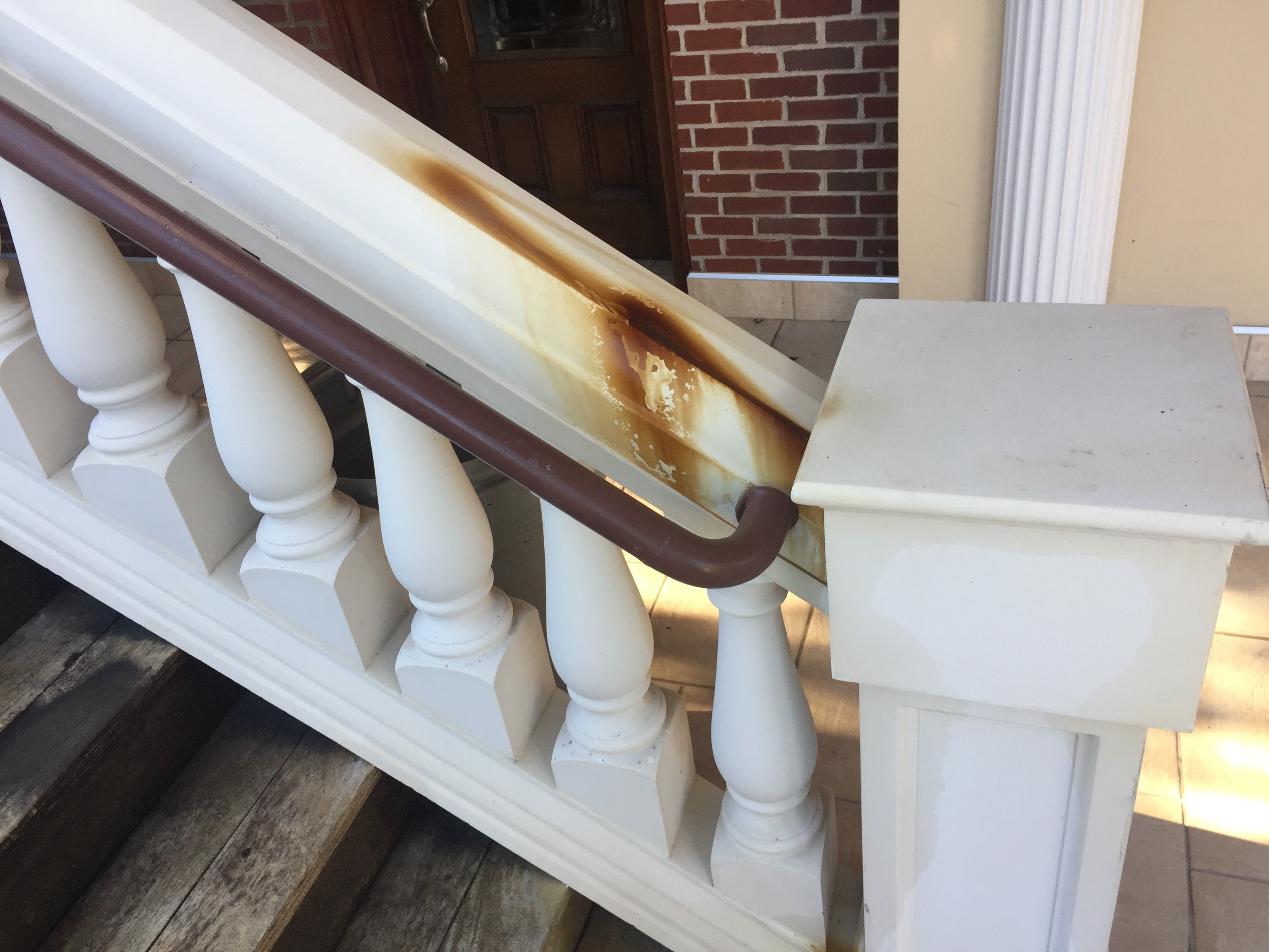 Commercial architectural stair and railing before exterior cleaning – Missions Pressure Washing service example