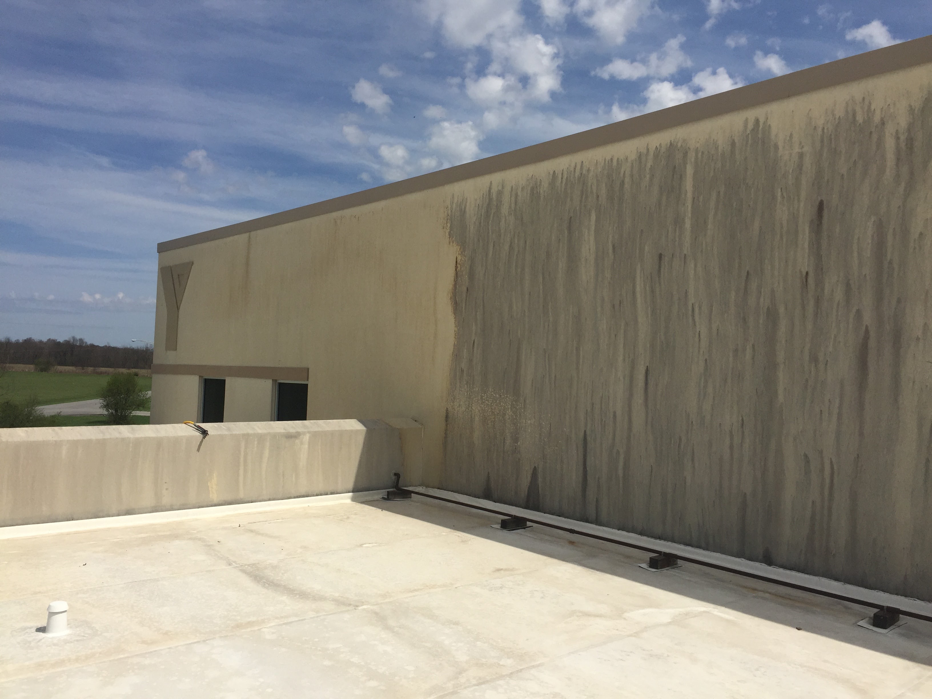 Commercial stucco exterior before cleaning – Missions Pressure Washing service example