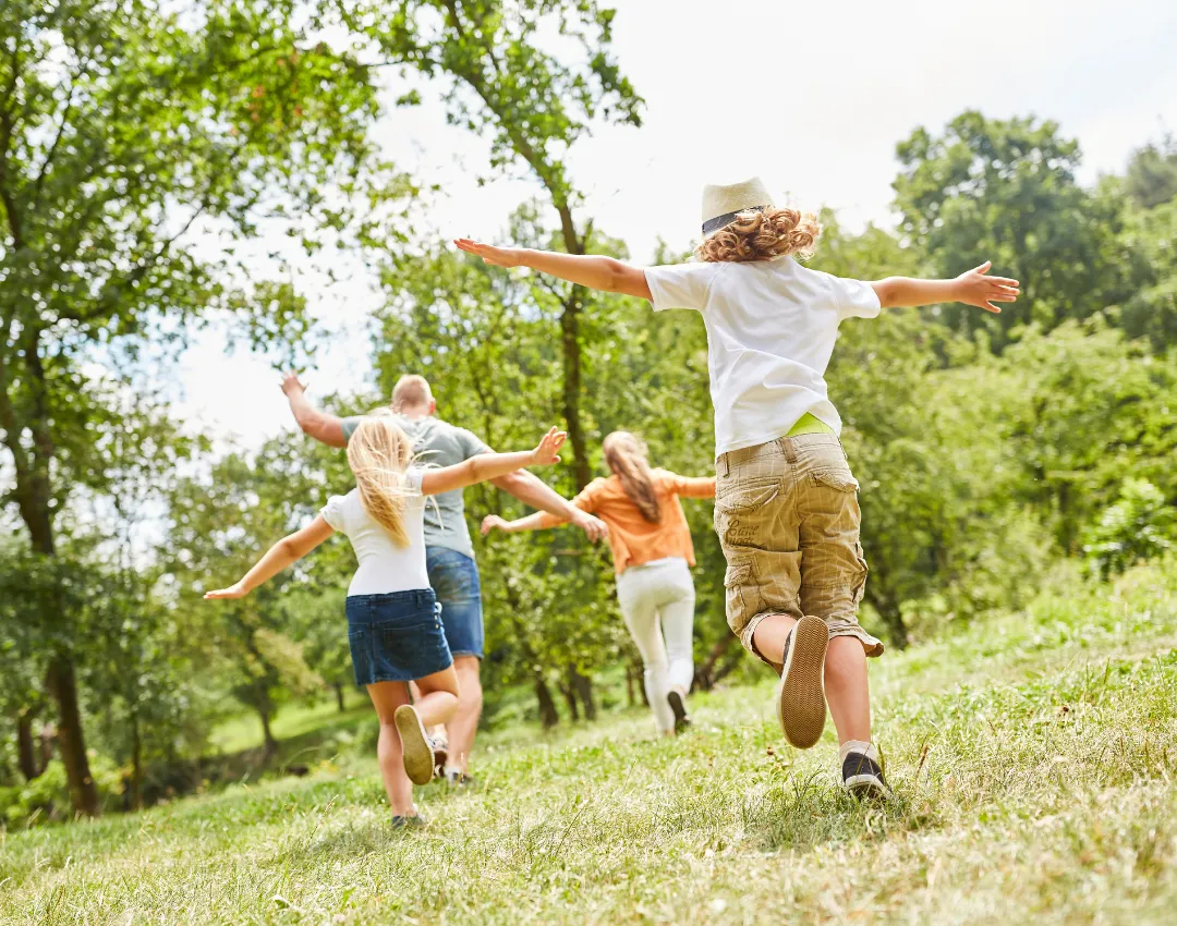 Children Running in Grass