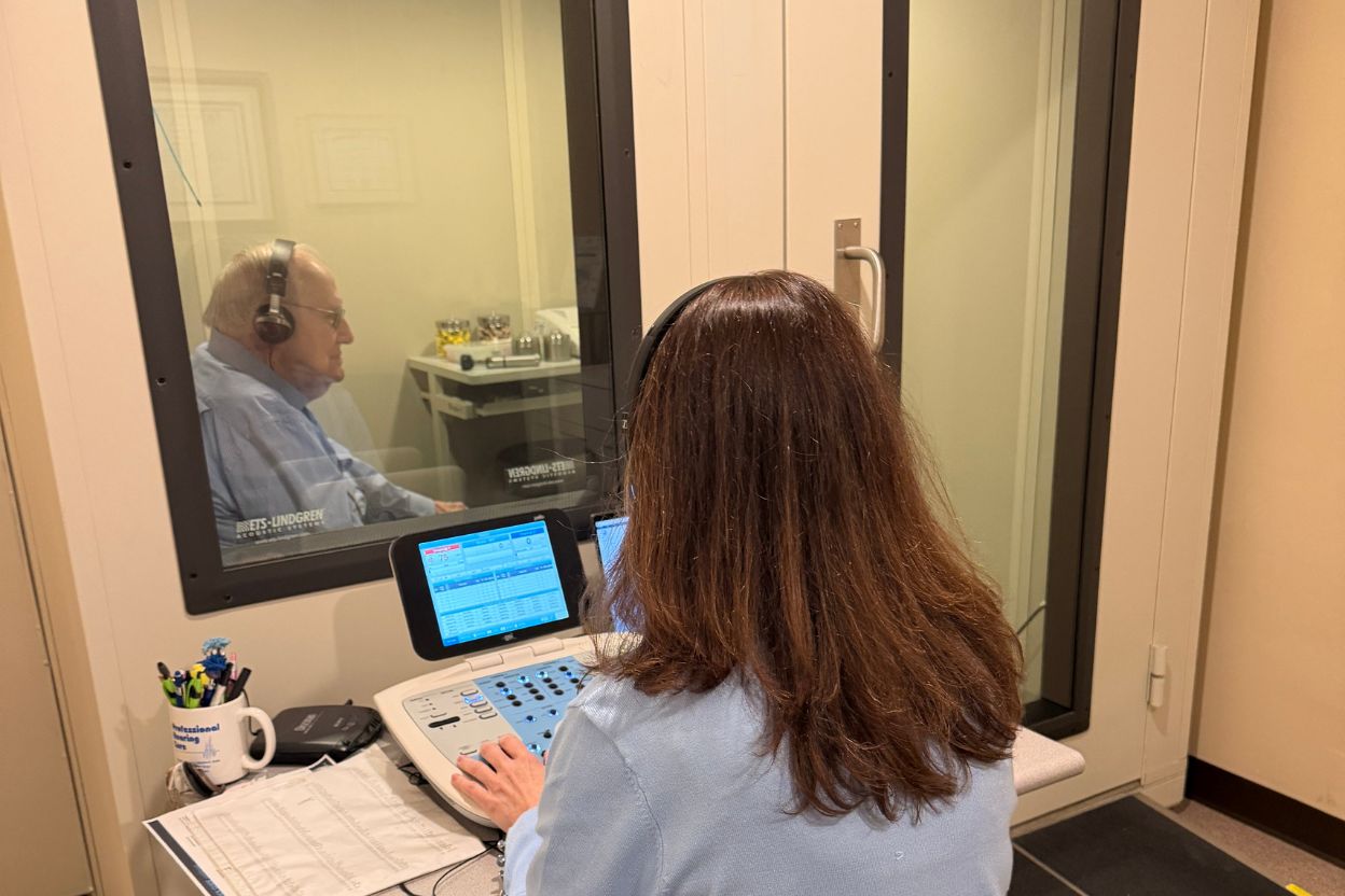 Dr Stout performing a hearing test