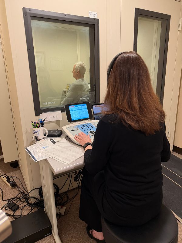 Dr Stout performing a hearing test