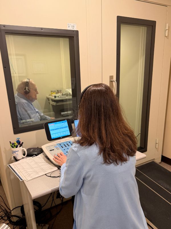 Dr Stout performing a hearing test