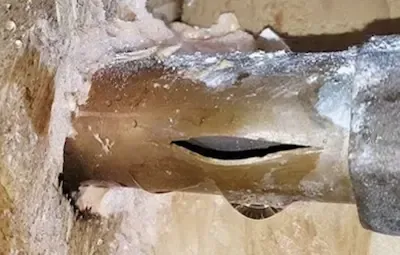 Split frozen pipe causing leak during winter plumbing issue in Gahanna