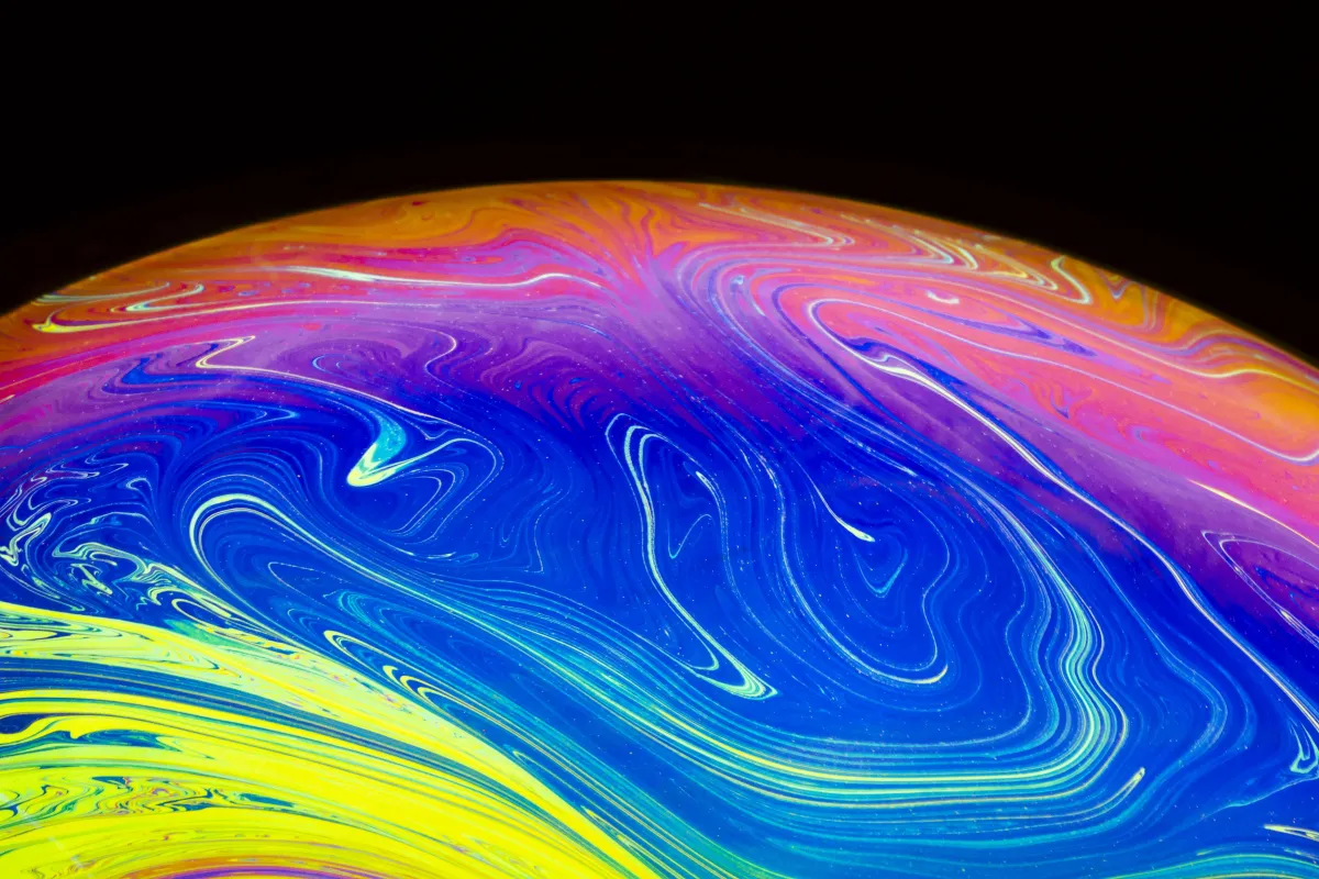 person doing yoga on seashore during daytime