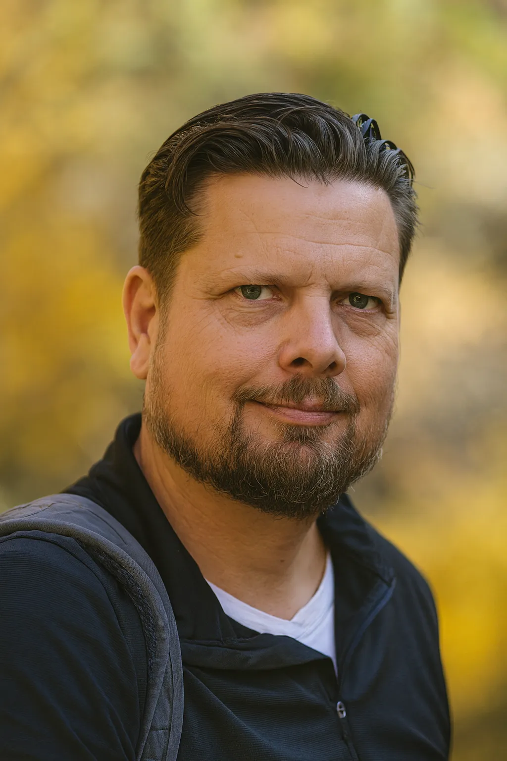 person wearing gold wedding band