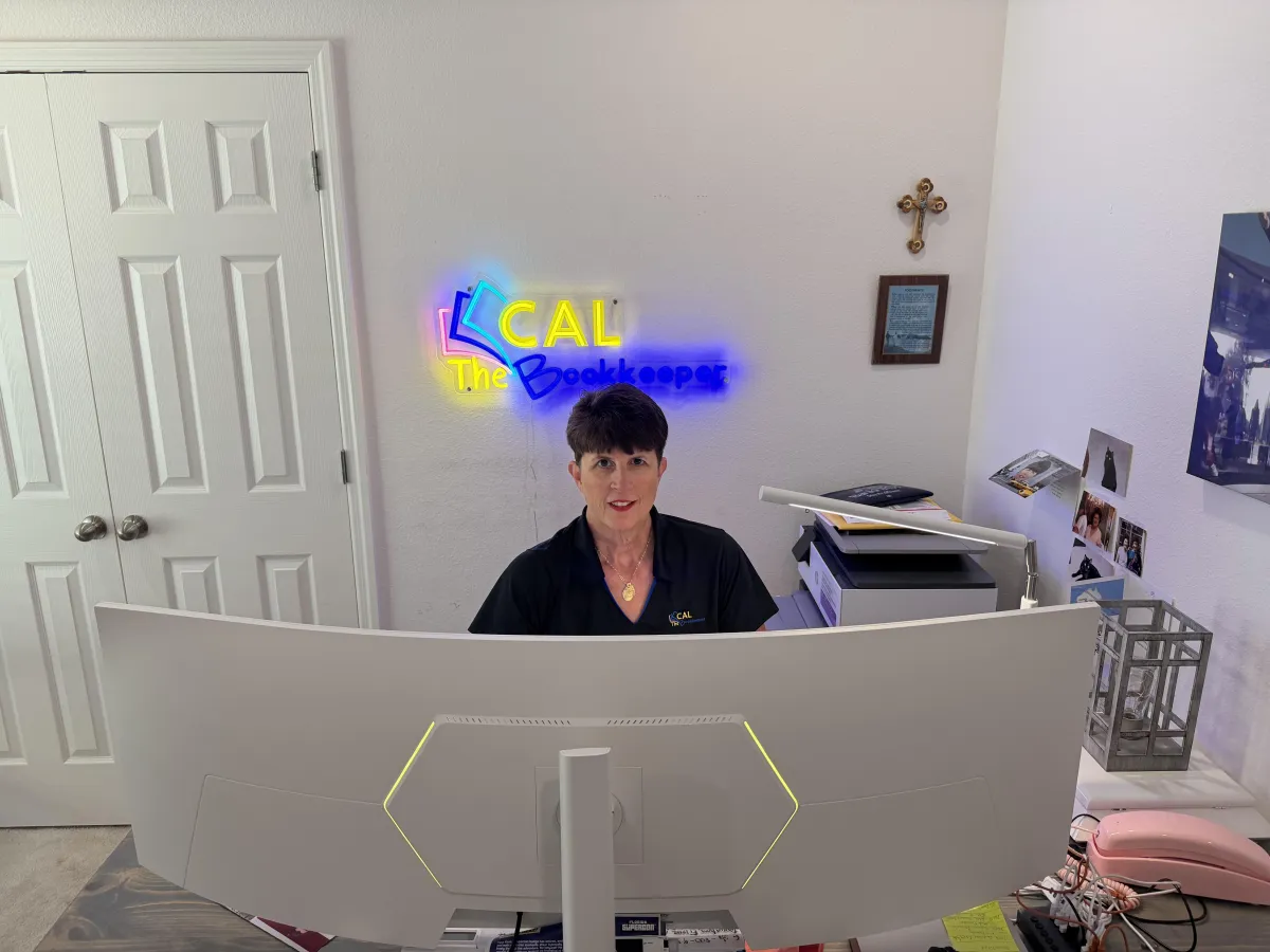 A local Groveland Florida business owner reviewing accurate bookkeeping records