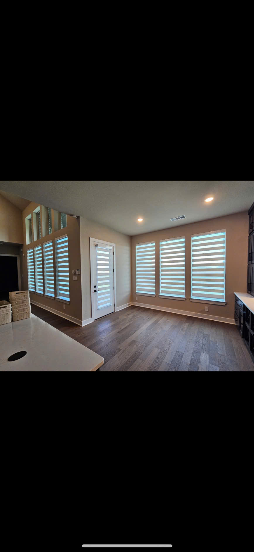 Interior window shutters providing privacy and natural light