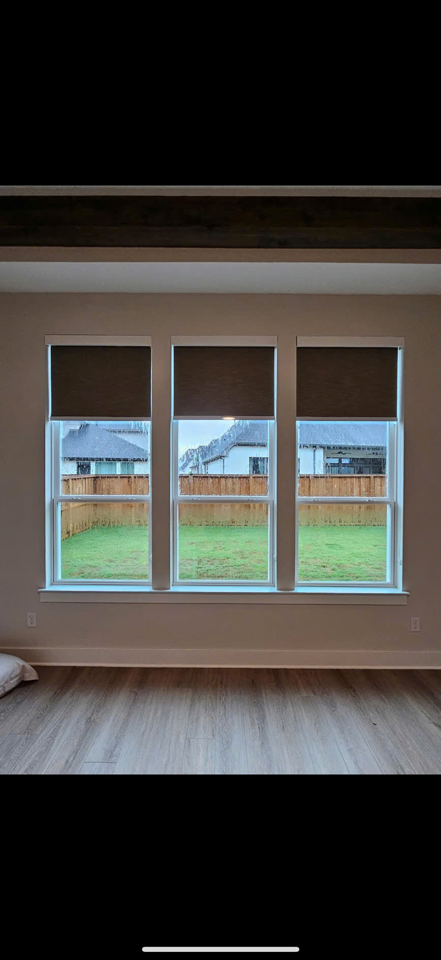 Café style shutters installed on a kitchen window