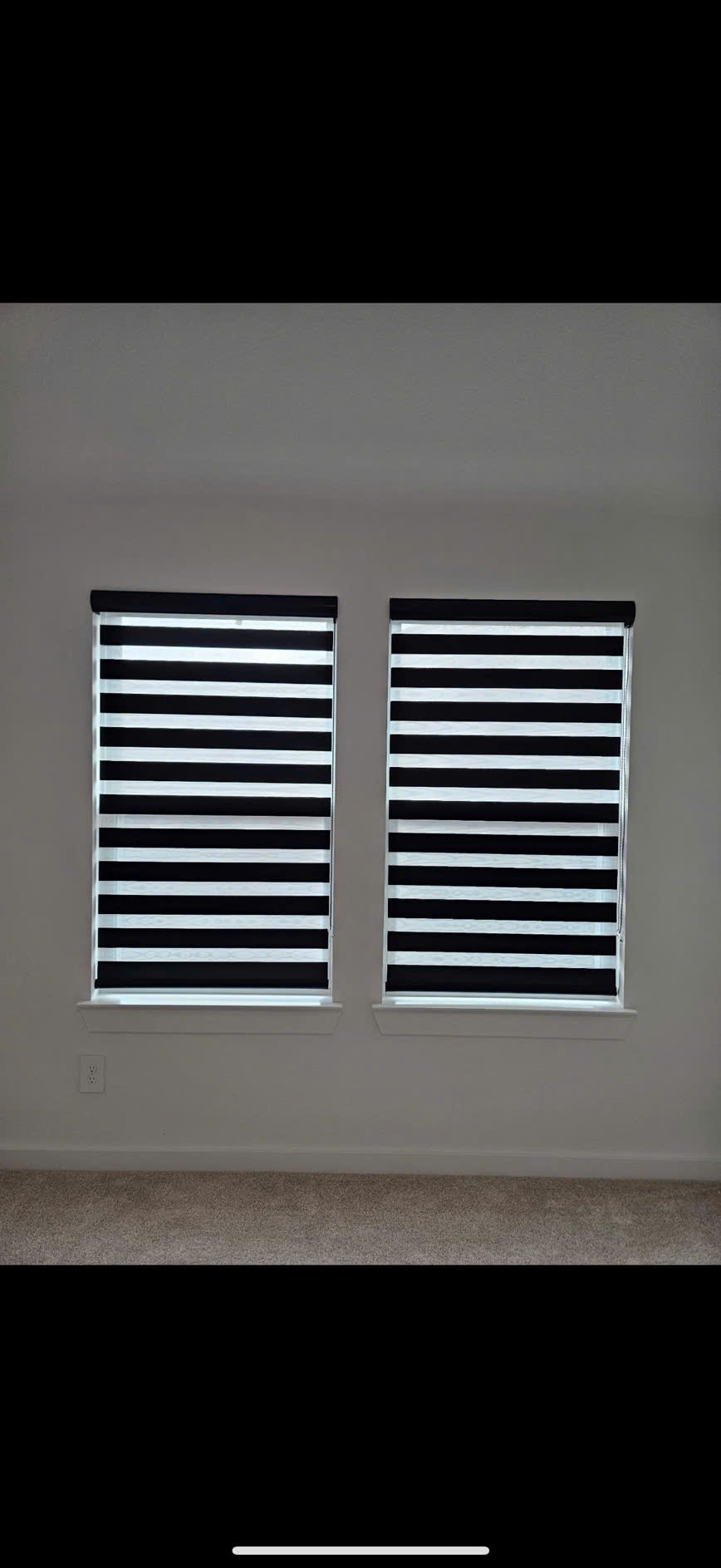 Full height plantation shutters providing privacy and light control