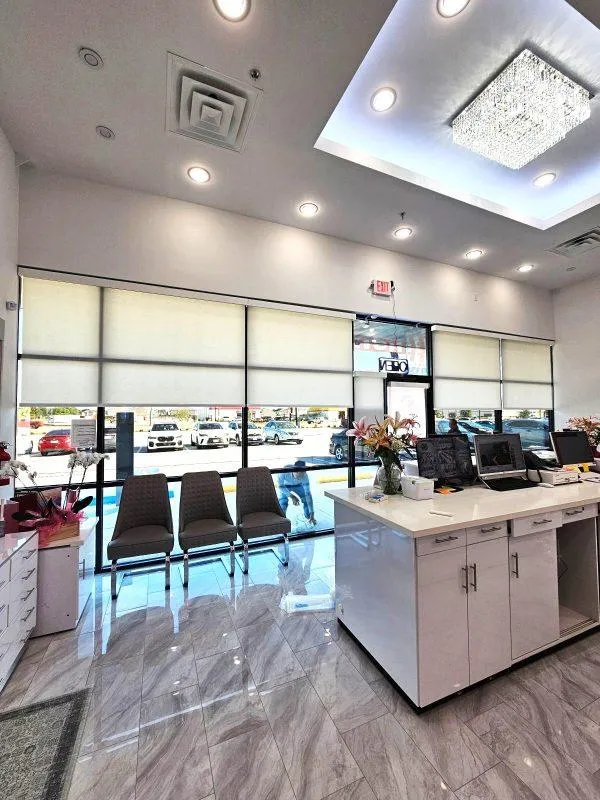 Commercial roller shades installed in a modern control room