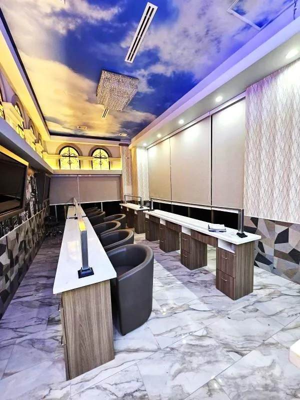 Custom commercial roller shades installed in a restaurant interior