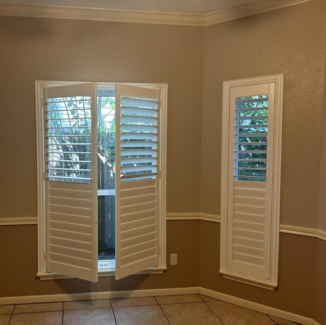 White plantation shutter panels with independently opening sections