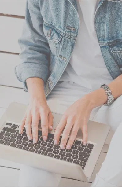 woman typing on computer