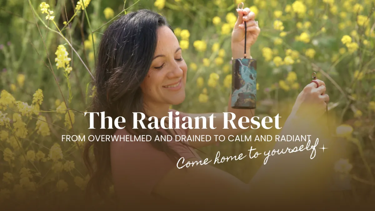 Confident woman in soft natural light, standing in a sunlit room, wearing elegant neutral attire, looking empowered and serene, with subtle gold jewelry, modern minimalist style, 3:2 aspect ratio