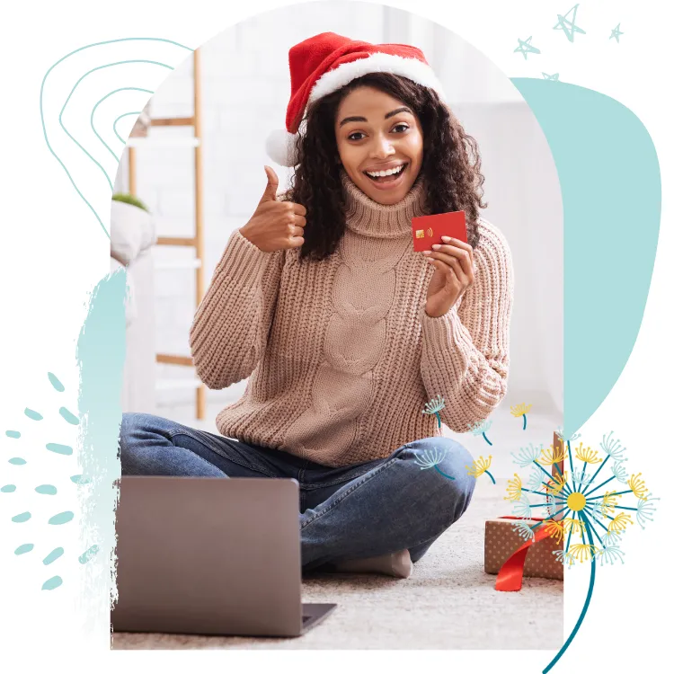 Lady sat in front of laptop with thumbs up