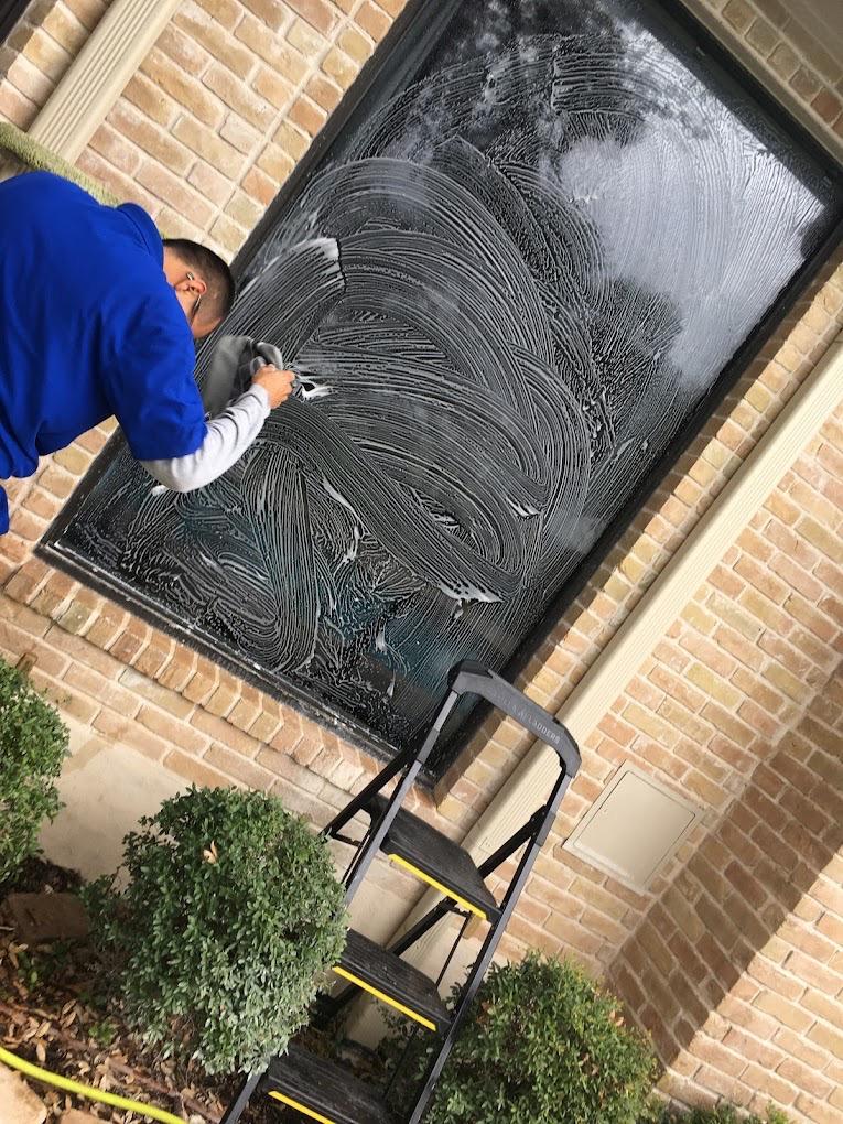 Professional window scrubbing service by DND Window Cleaning in San Antonio
