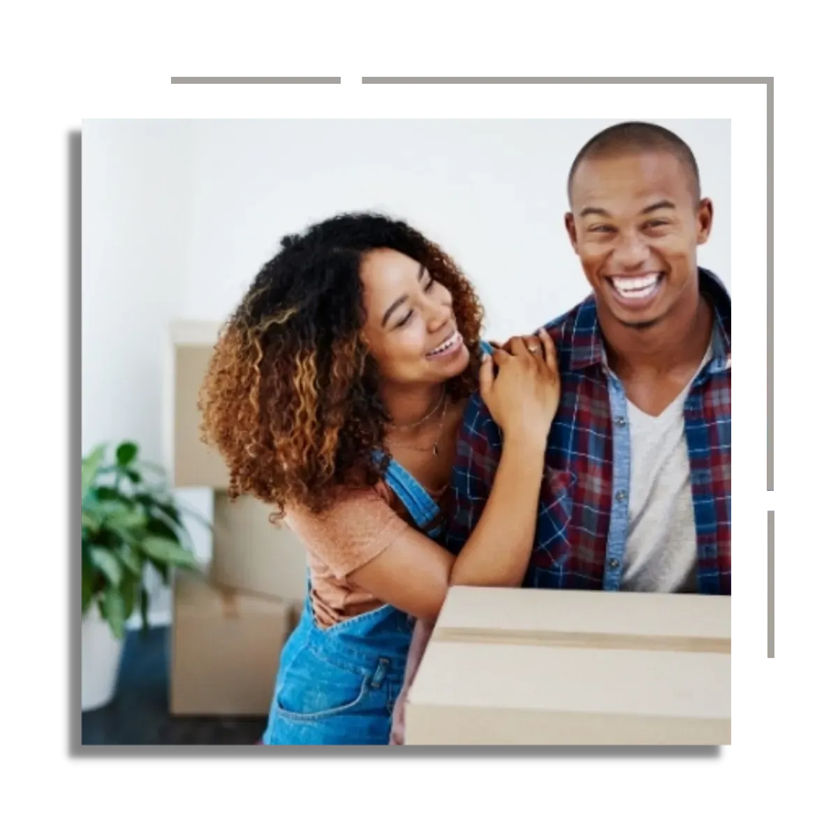 happy couple with moving boxes