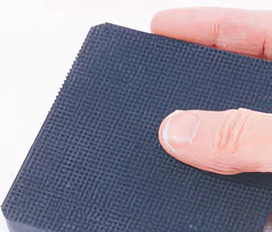 Close-up of High Tech Machine Cushion Pad with tiny suction pockets to prevent machines from slipping or moving