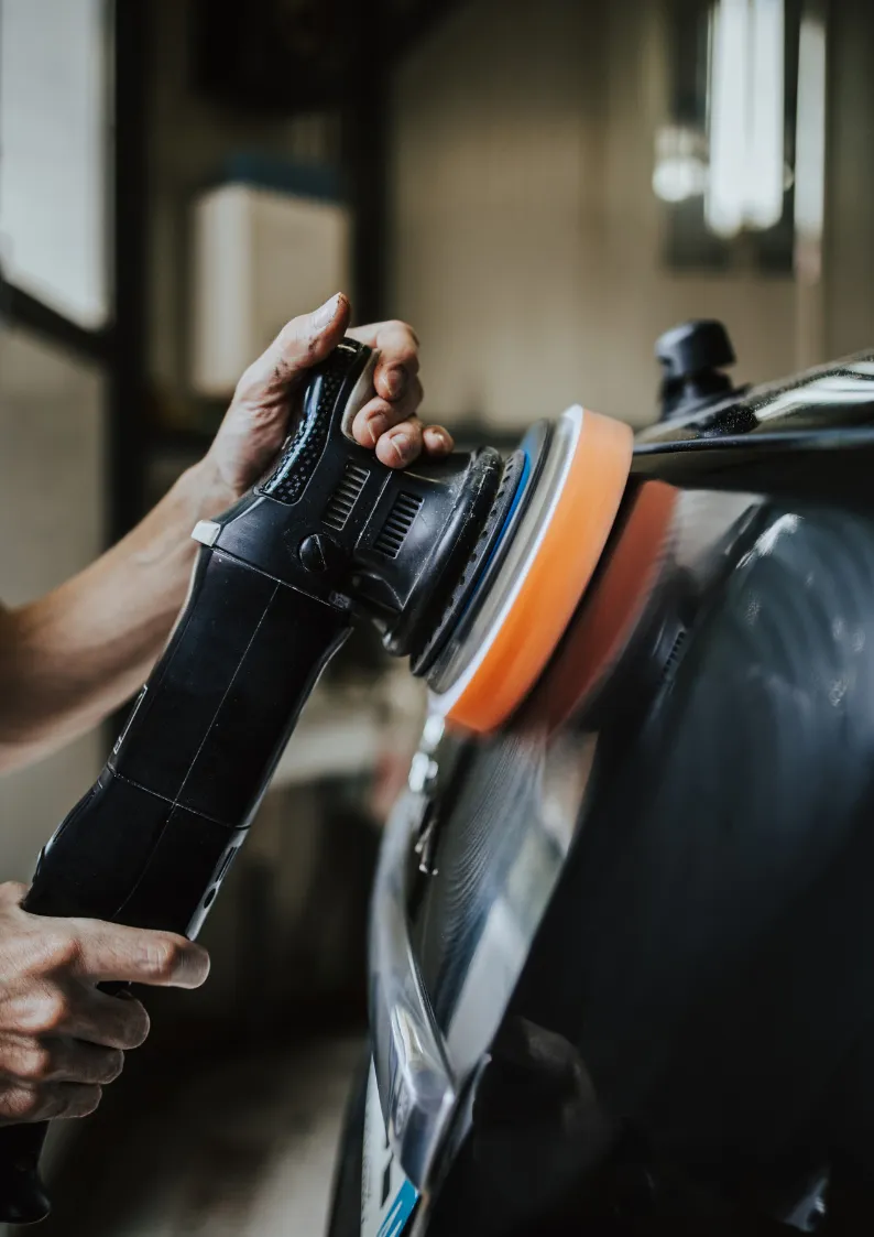 Black car getting paint corrected