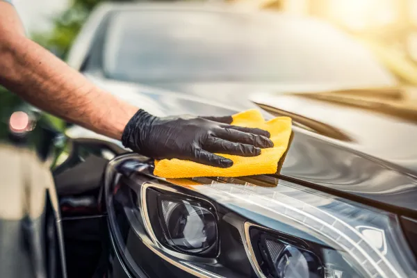 Car exterior getting polished 