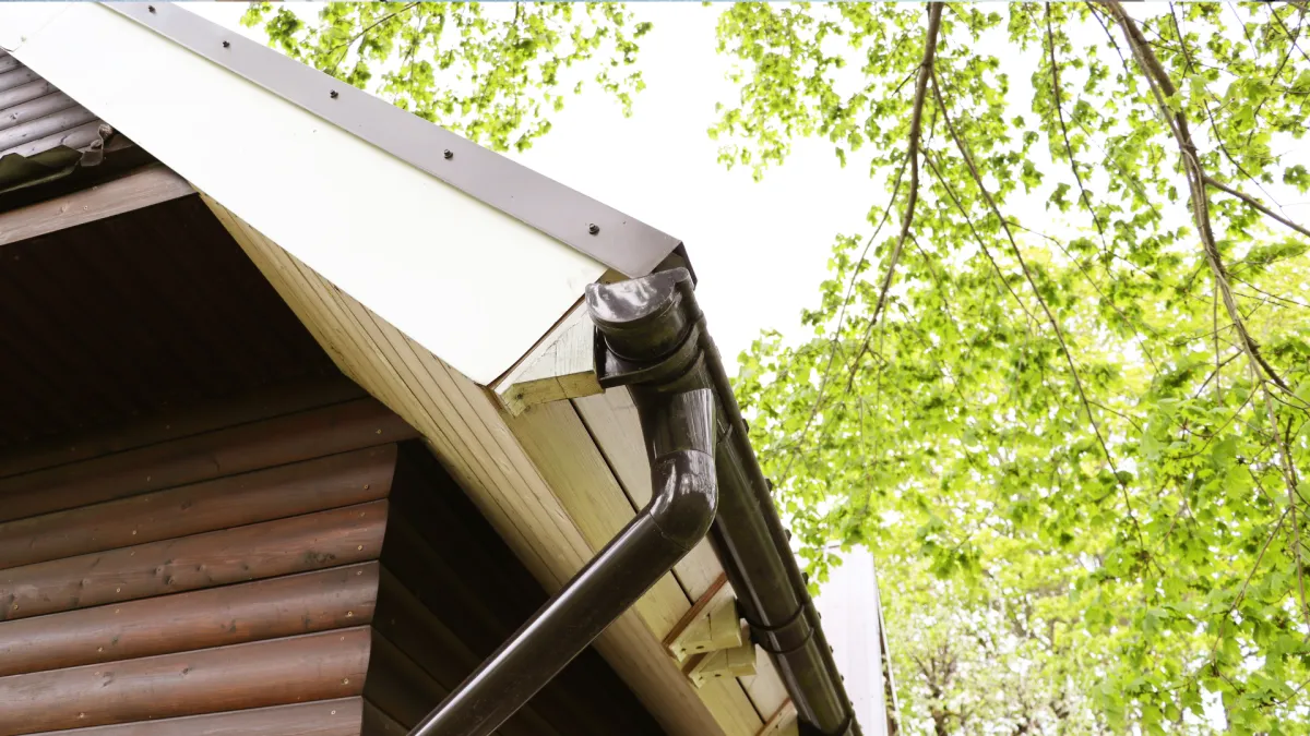 Gutter repair and downpipe flush in Chatswood to stop overflow during heavy rain.