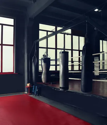 Boxing gym exterior with large windows and modern design