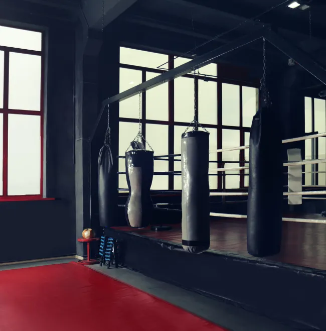 Boxing gym exterior with large windows and modern design