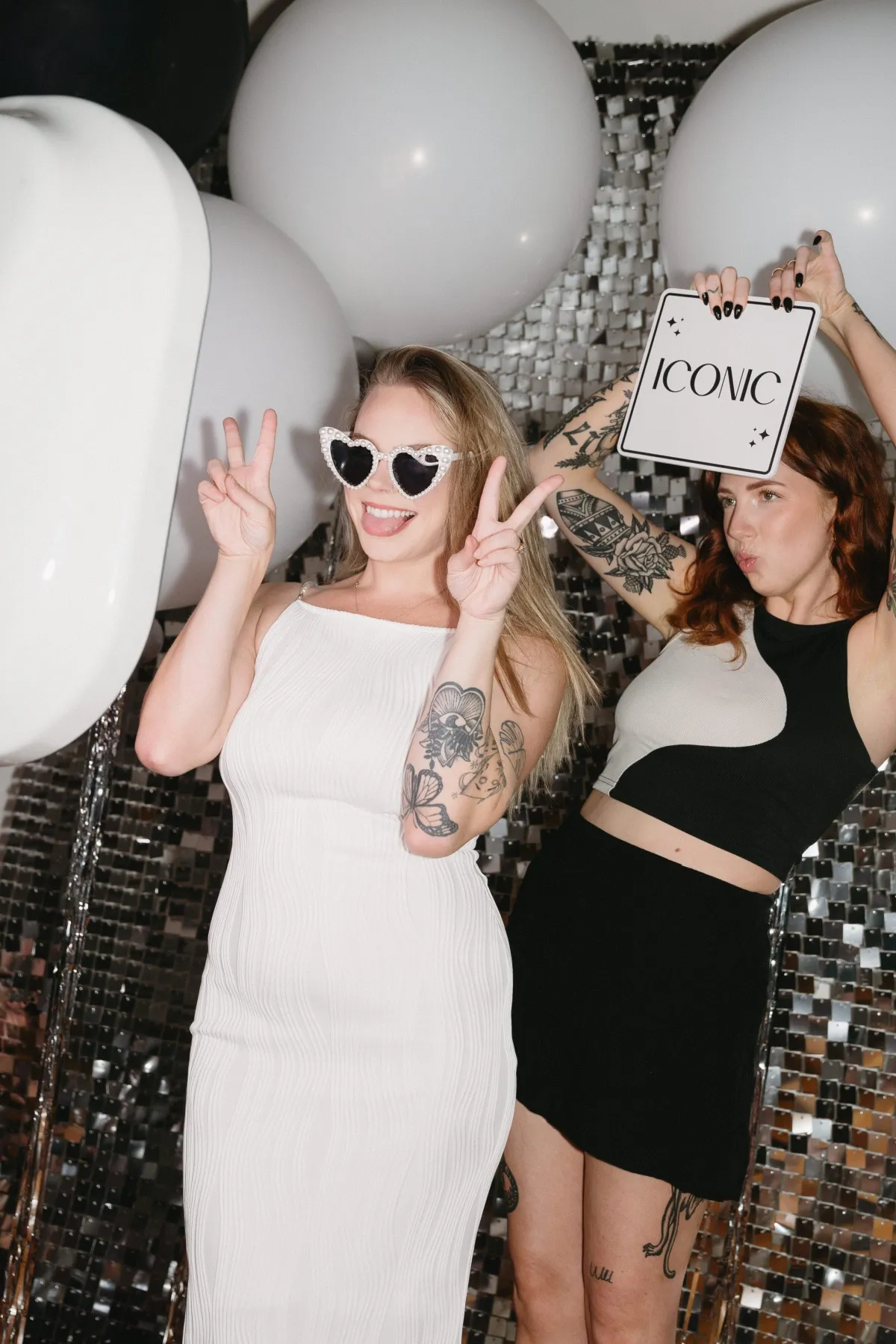 bridesmaids taking photo booth pictures in an upscale wedding in Pueblo