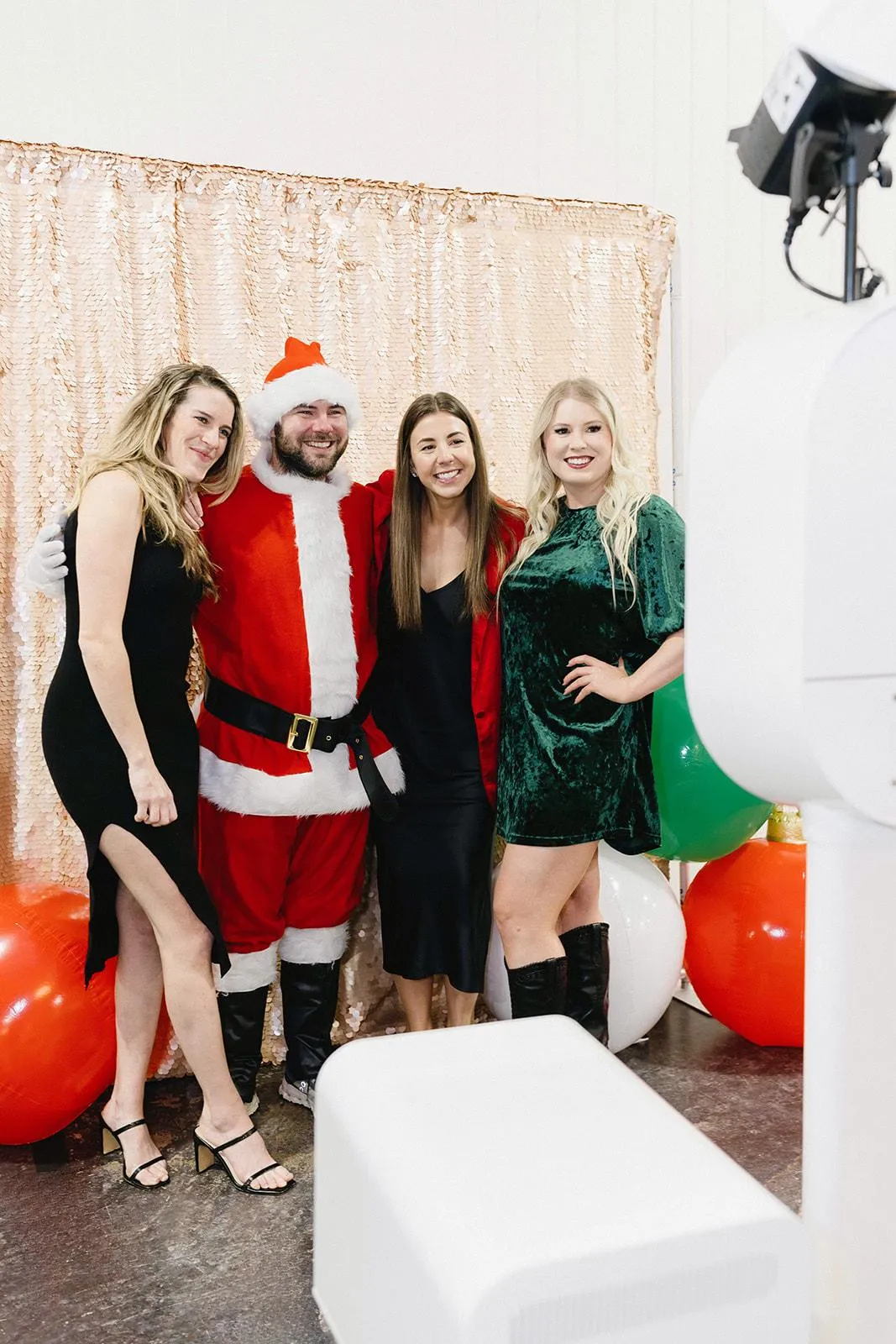 coworkers having fun at a corporate company christmas party in an elegant venue in pueblo