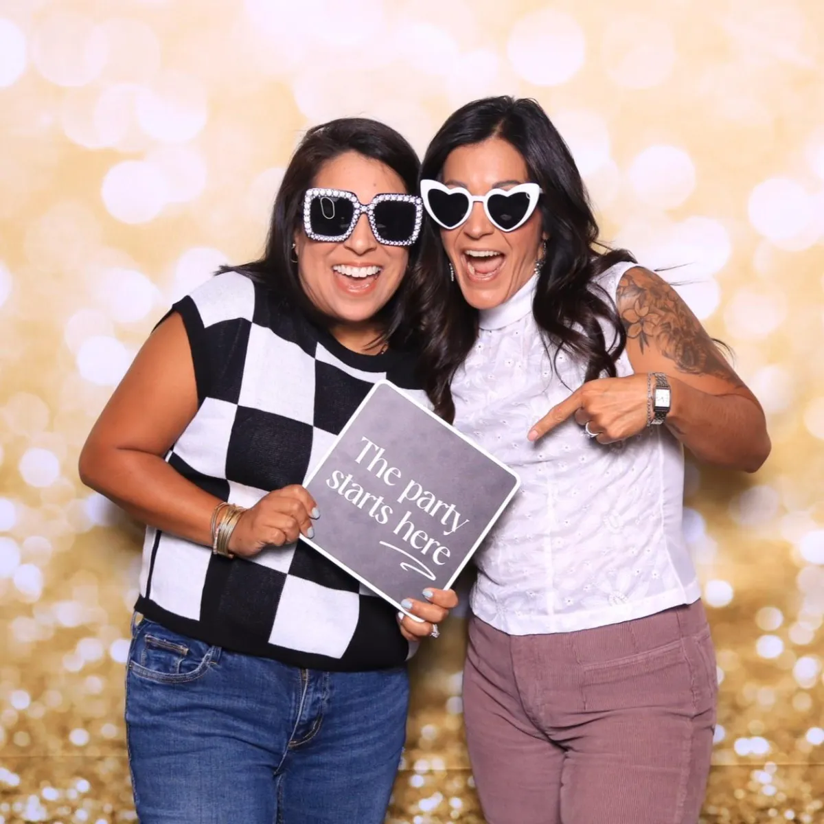 Guests posing with fun props at Martini Moment Photo Booth during Bingo, Bags & Heroes fundraiser at Pueblo Convention Center