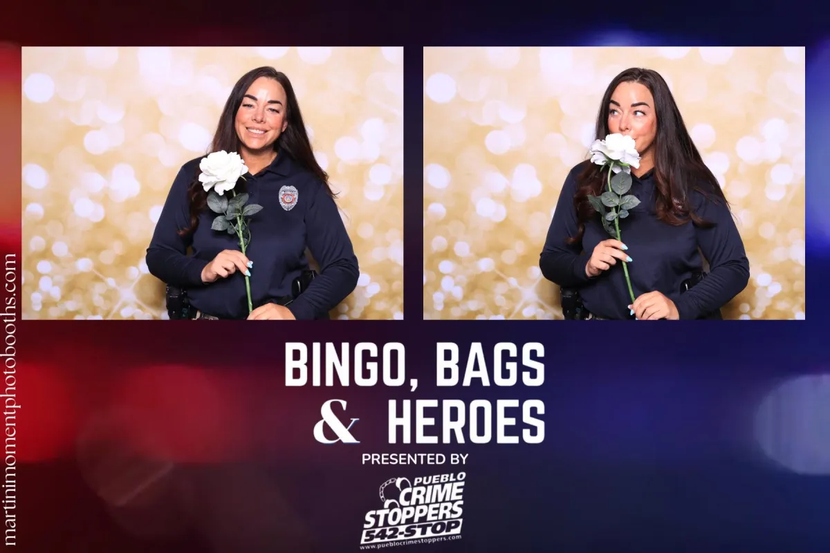 Police officer posing in luxury Photo Booth with elegant props during local fundraiser