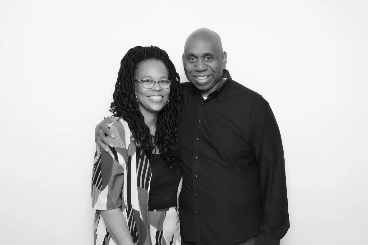 Married couple taking Glam photo booth with skin-smoothing Hollywood filter at upscale wedding in Colorado Springs