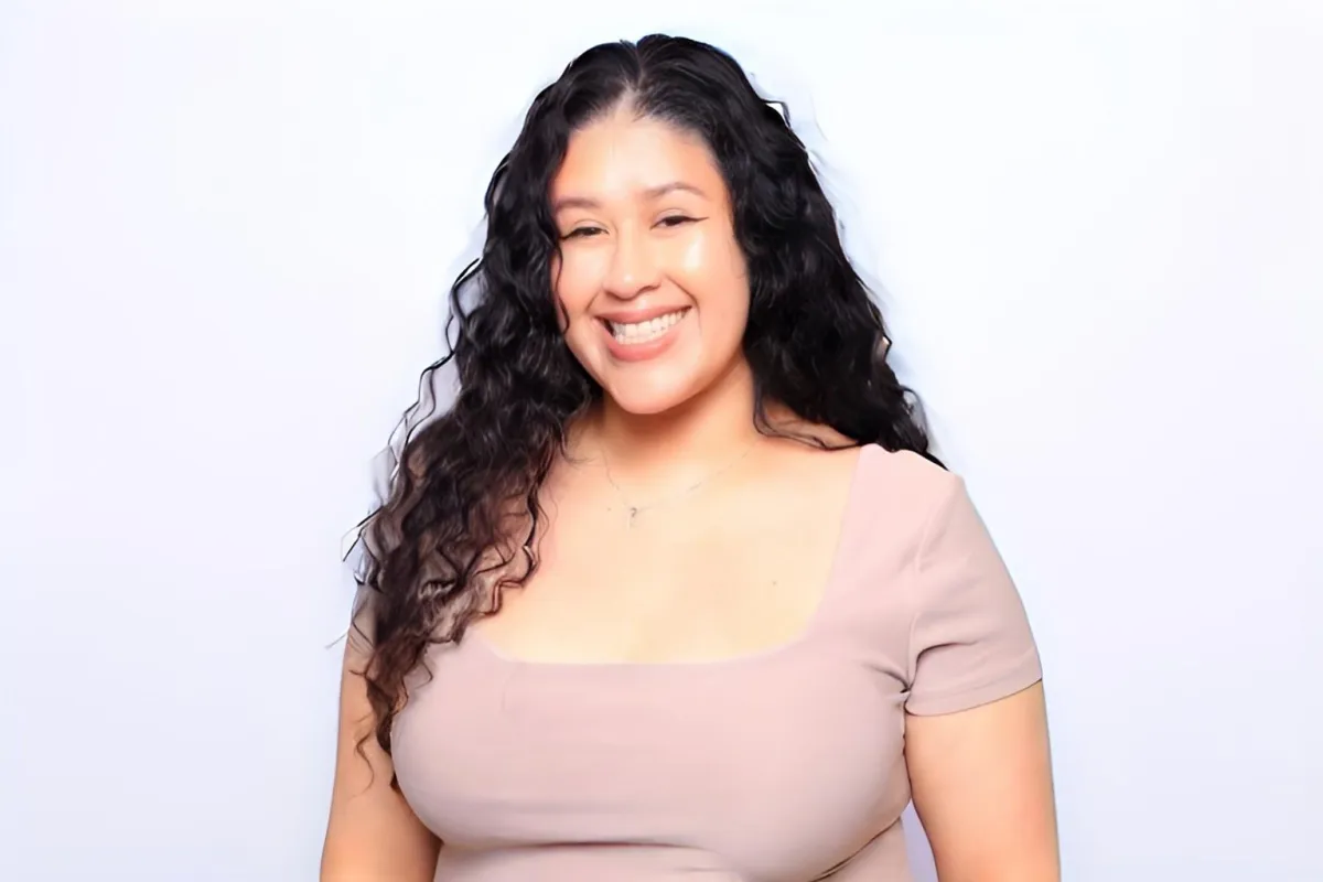 Karla, founder of Martini Moment Photo Booths, smiling while sharing her passion for capturing unforgettable wedding and event memories