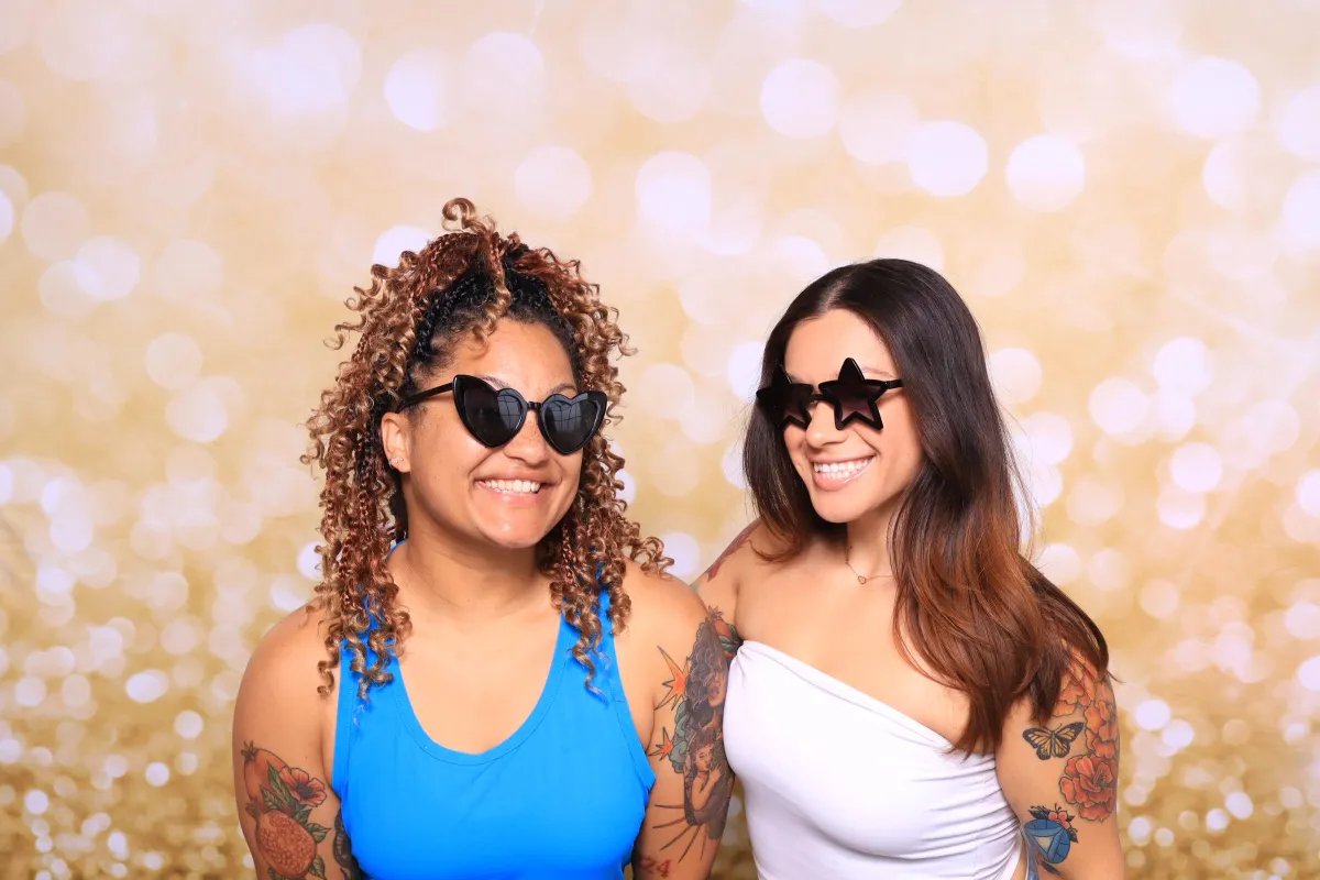 Guest posing in a luxury photo booth at Colorado Spring's Meanwhile Block