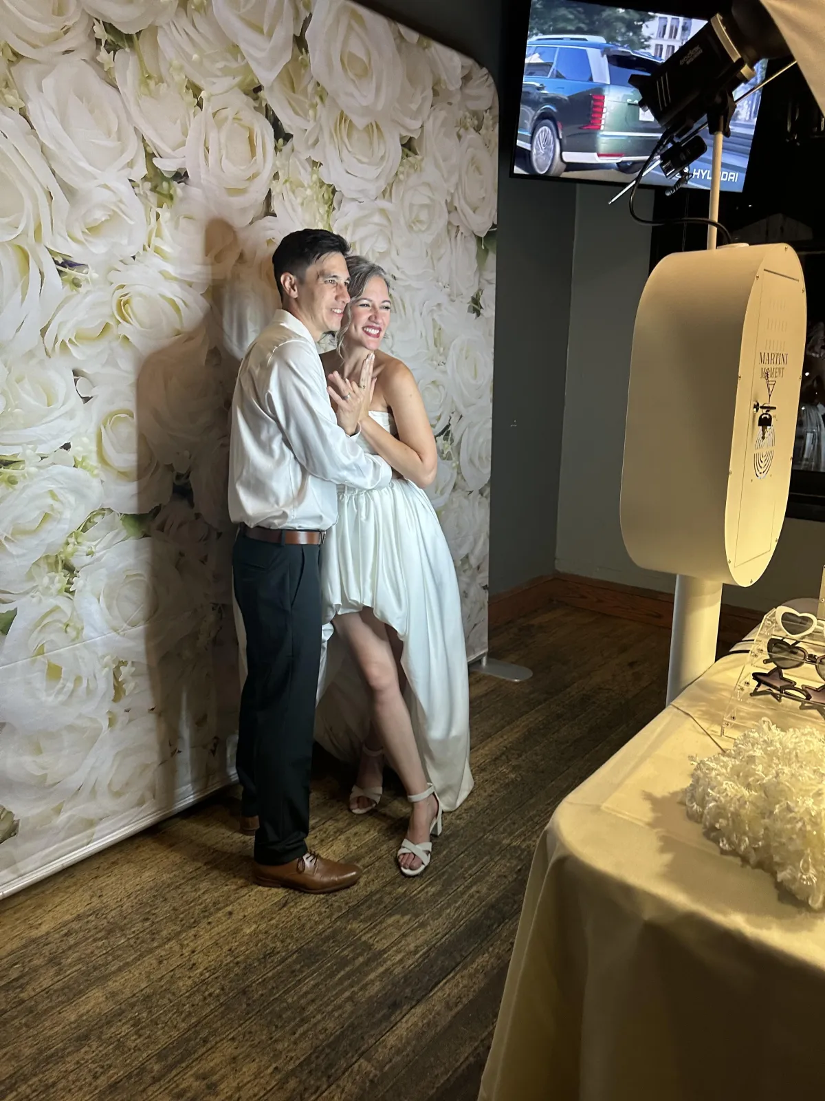 Corporate team enjoying a luxury glam photo booth at a holiday party in Colorado Springs