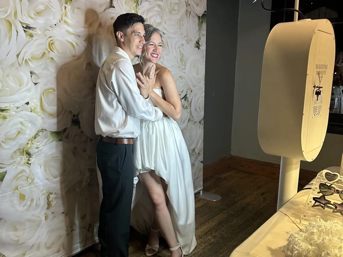 Bridesmaids at elegant wedding in Colorado Springs in martini moment's video guest booth